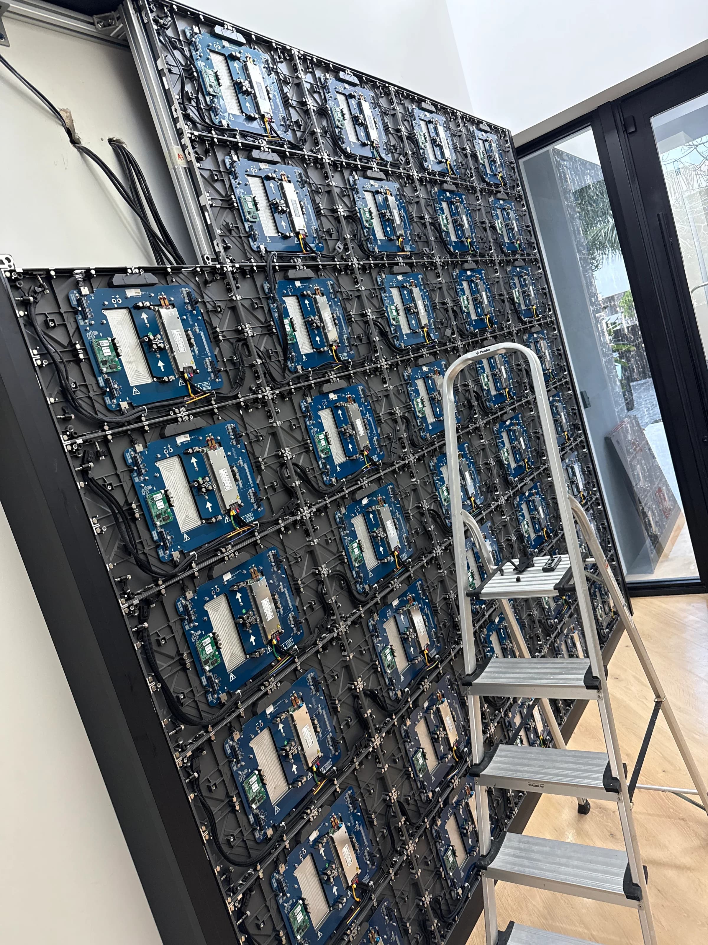 Custom LED video wall modules staged on the floor before installation