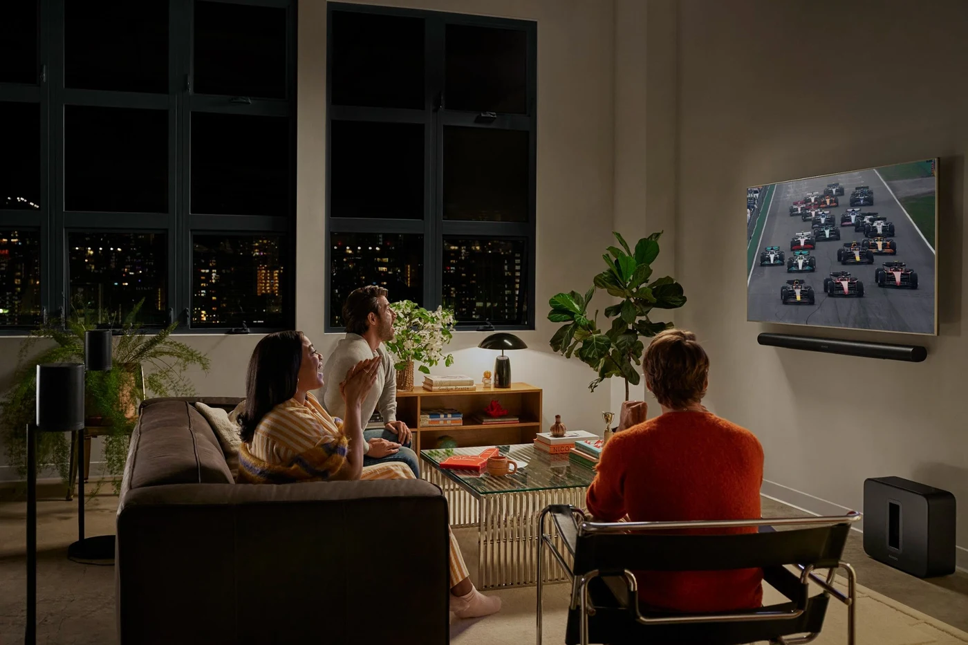 A living room with a TV and integrated soundbar